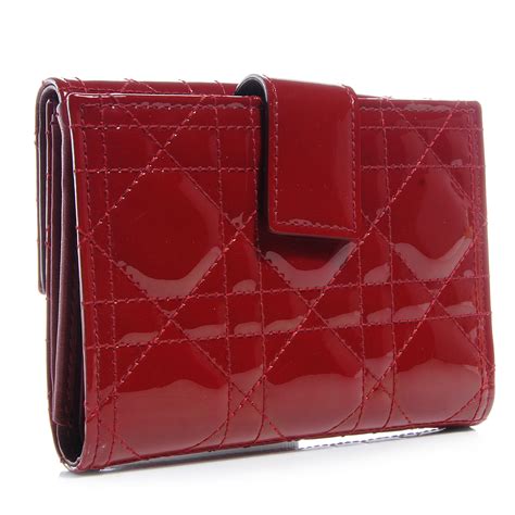 dior red compact wallet.